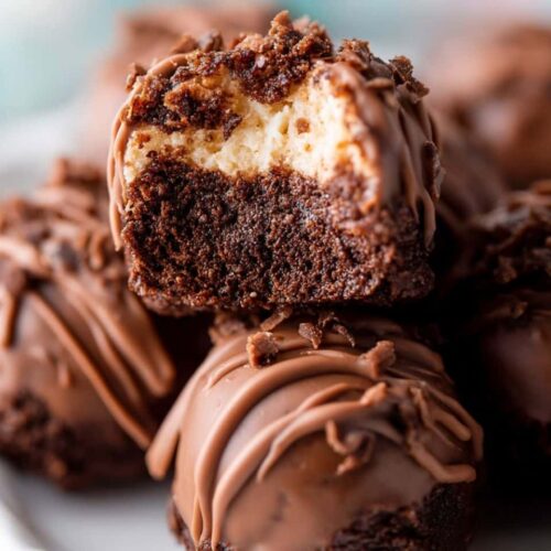 brownie balls on a plate in rustic kitchen