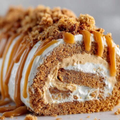 No-bake Biscoff cake roll sliced with creamy filling