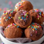 no bake brownie balls recipe on rustic plate