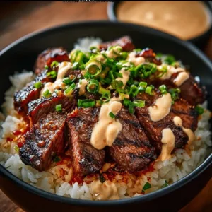 Korean BBQ Steak Rice Bowl with fresh vegetables and savory sauce