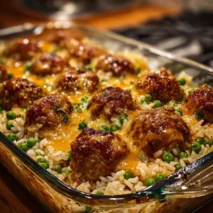 Honey Garlic Meatball Rice Bake 2 Delicious Honey Garlic Meatball Rice Bake served in a dish