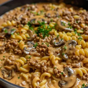Beef Stroganoff with Hamburger Helper served in a bowl with parsley garnish.
