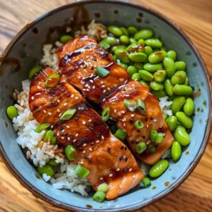 Delicious Honey-Glazed Teriyaki Salmon Bowl garnished with fresh vegetables