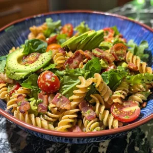 Pasta Salad with Avocado and BLT served in a bowl