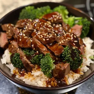 Delicious Teriyaki Steak Rice Bowl with marinated steak and fresh vegetables